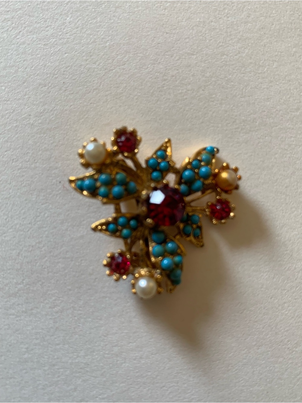 Gold-Tone Floral Brooch with Turquoise Beads and Red Stones